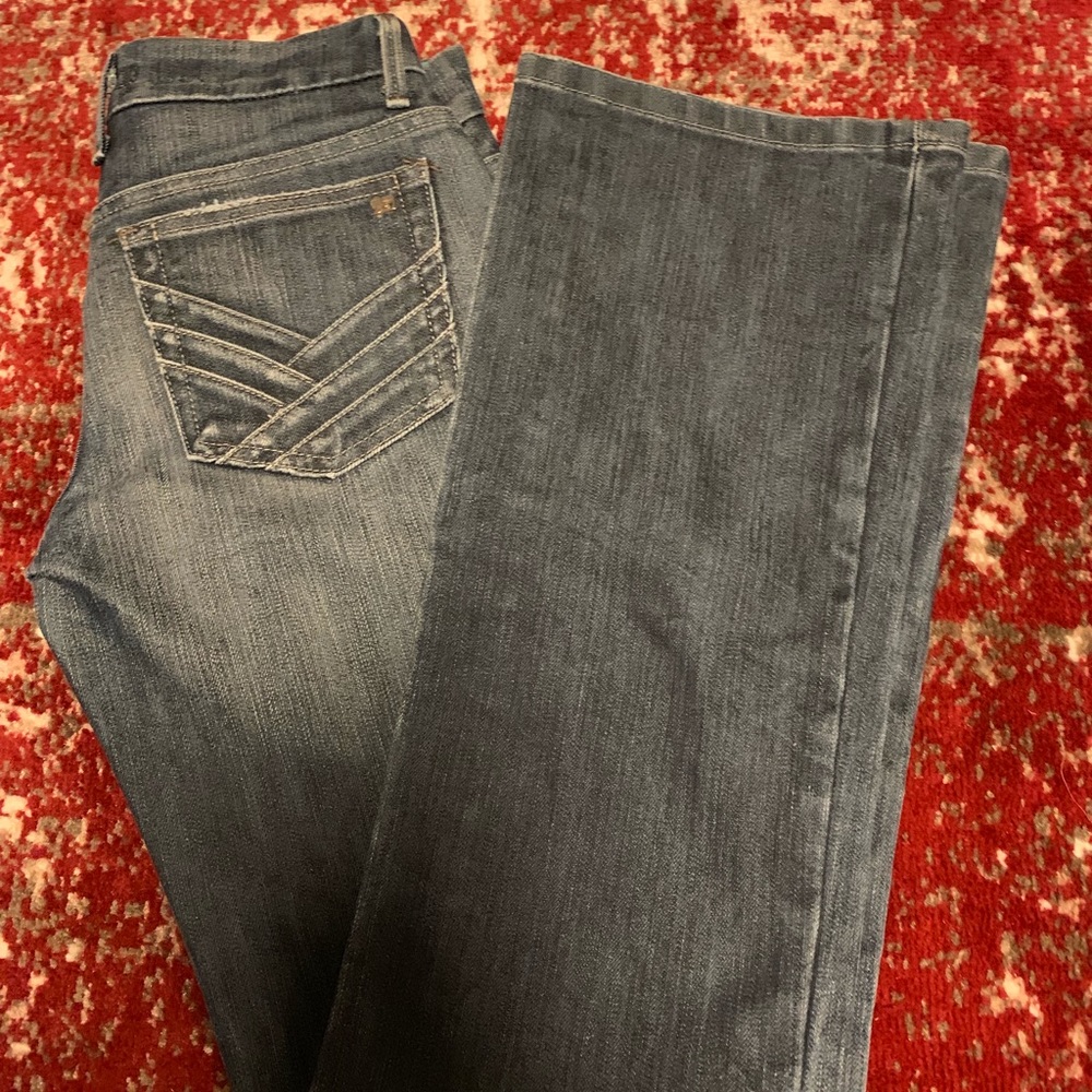 Joe’s Jeans dark blue wide leg jeans.